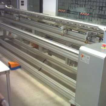 AXIAL ROLL UP MACHINE FOR PRINTED FABRICS