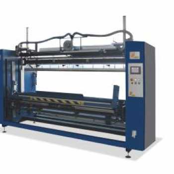 PACKAGING MACHINE FOR ROLLS
